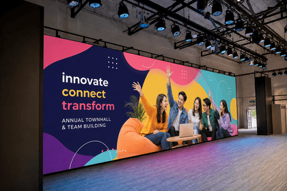 LED rental stage with vibrant townhall event visuals.